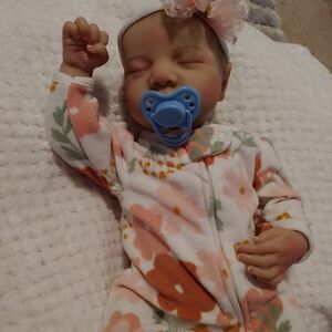 Realistic baby doll